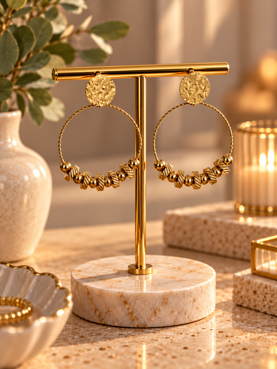 Boucles d'oreilles Créole Tressée dorées faites main par Camille Fraise